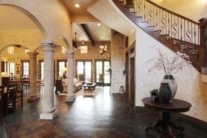 Entry-looking-into-arches-at-dining-family-room-beyond